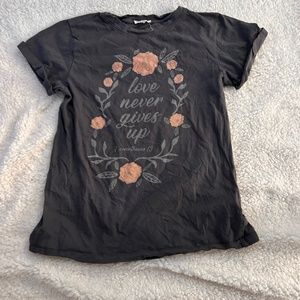 Grey “Love Never Fails” Tee